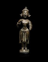 An Indian Bronze Figure of a Standing Female Attendant