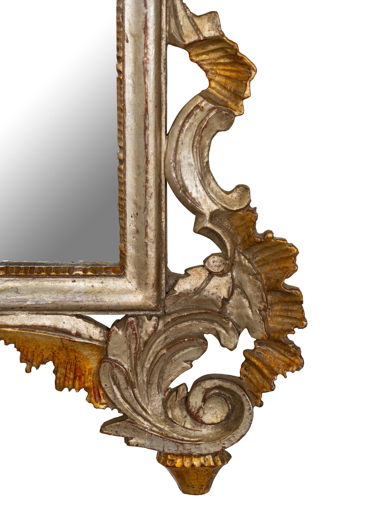 An Italian Baroque Style Giltwood Mirror
