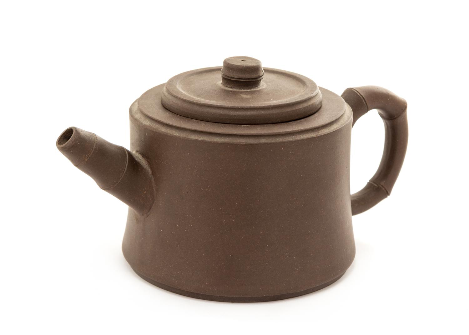 A Yixing Pottery Teapot Height 3 1/2 inches.