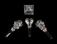 A Pair of French Sconces together with a Pair of Candlesticks and Four Stoppers