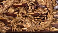 Two Chinese Gilt and Red Lacquered Wood Panels