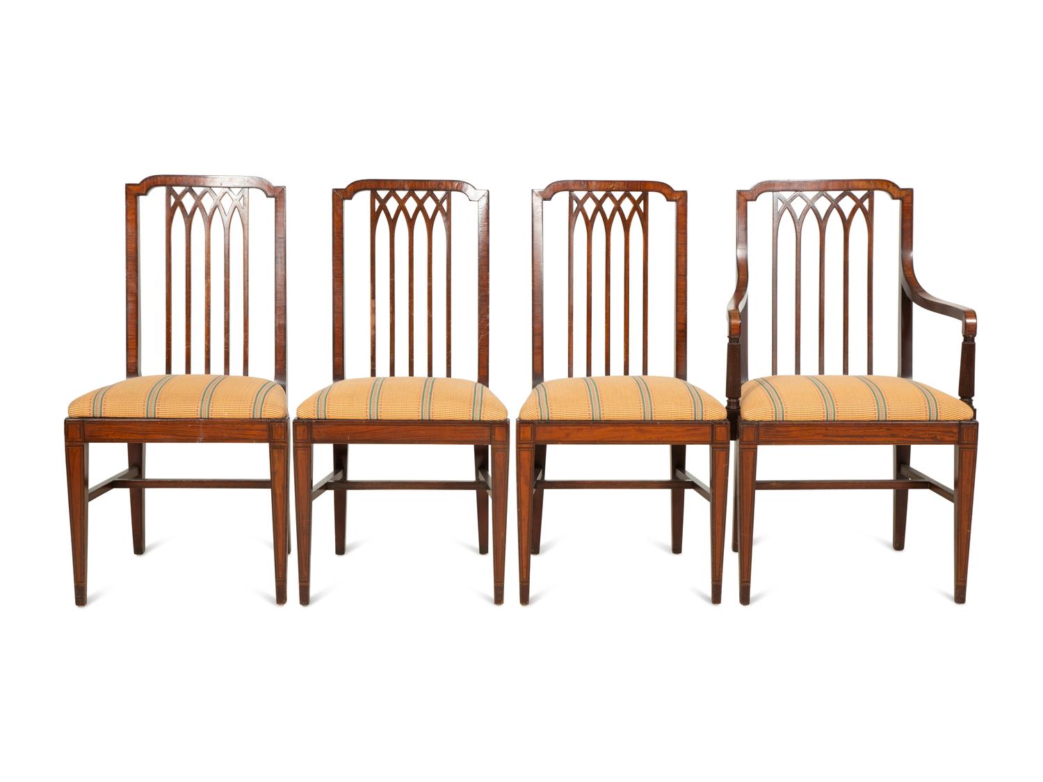 A Set of Eight George III Gothic Style Mahogany Dining Chairs