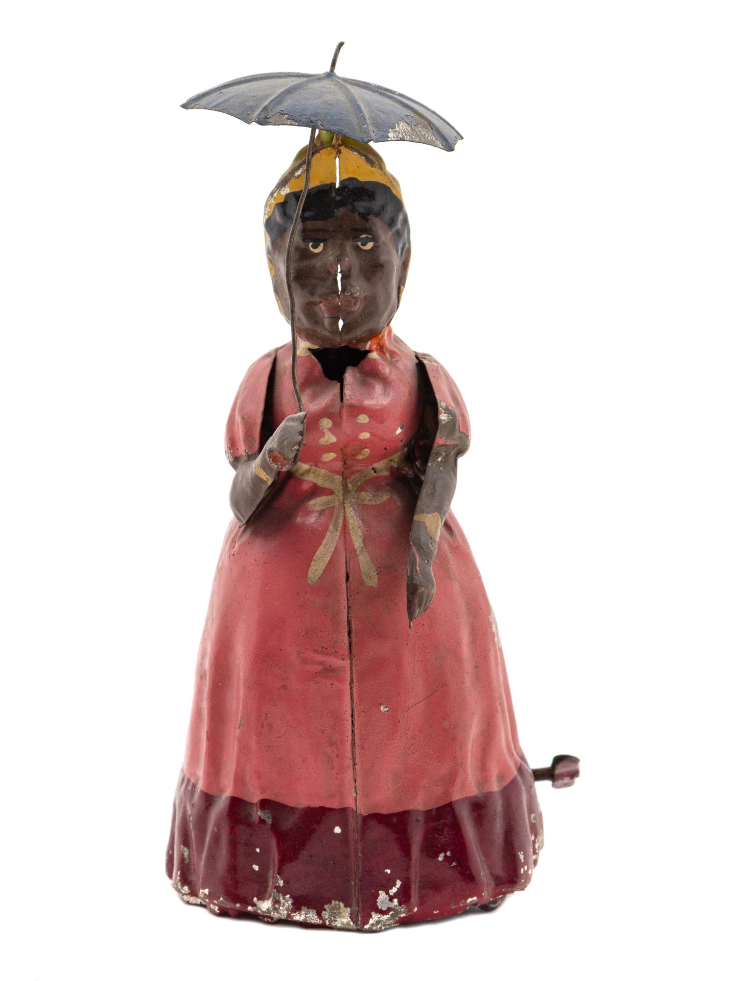 A German Tin "Parasol" Toy