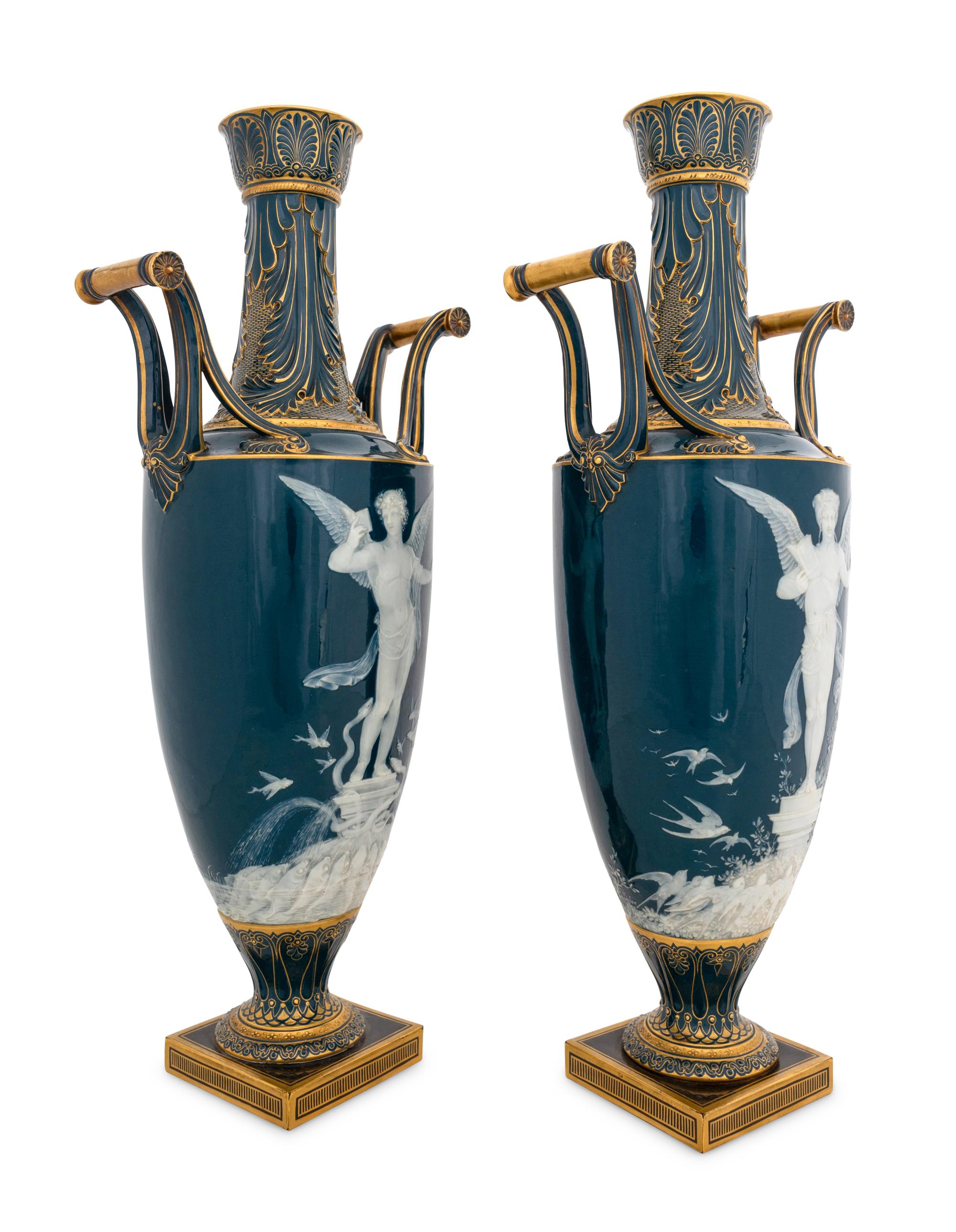 A Fine Pair of Mintons Pâte-sur-Pâte Peacock Blue-Ground Vases