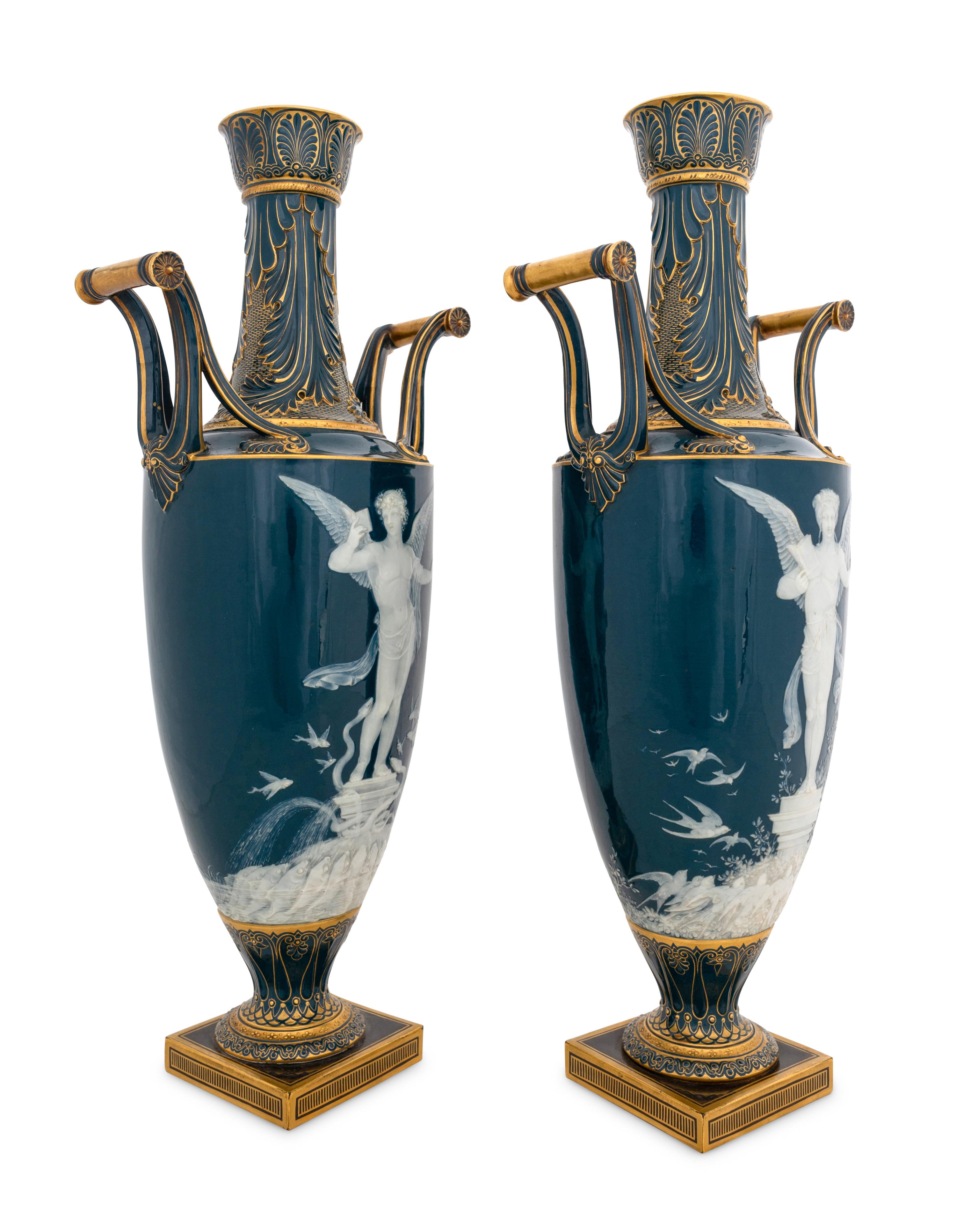 A Fine Pair of Mintons Pâte-sur-Pâte Peacock Blue-Ground Vases