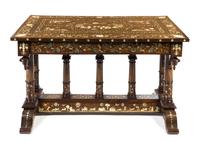 A Continental Brass, Bone and Mother-of-Pearl Inlaid Table Height 30 1/4 x width 51 5/8 x depth 28 1/4 inches. — PROBABLY NORTHERN ITALIAN, 19TH CENTURY
