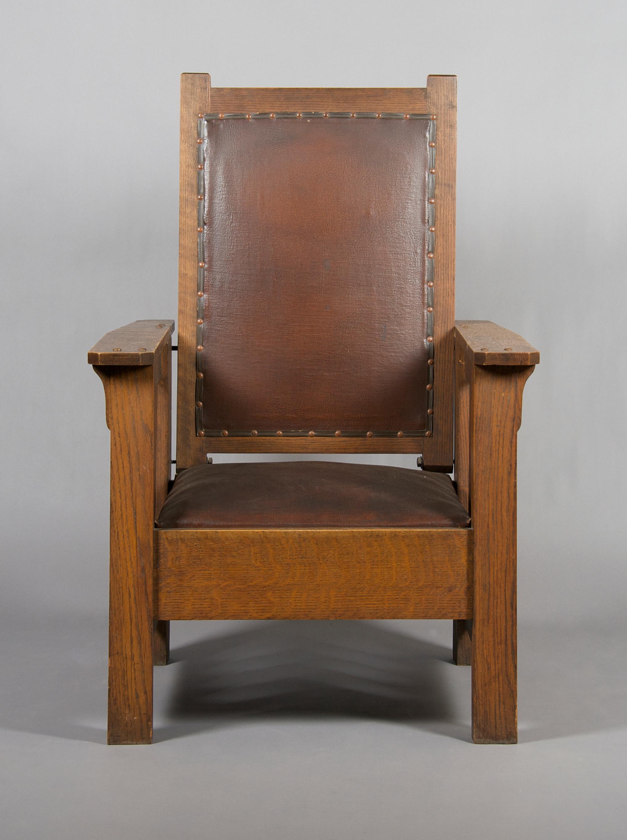 An American Arts & Crafts Oak Morris Chair, Height 45 3/4 inches.
