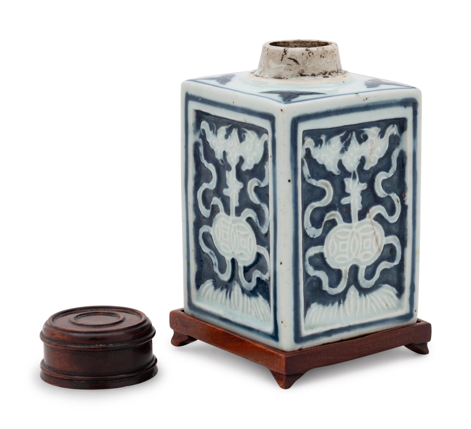 A Chinese White Slip Decorated Blue Ground Rectangular Tea Caddy
