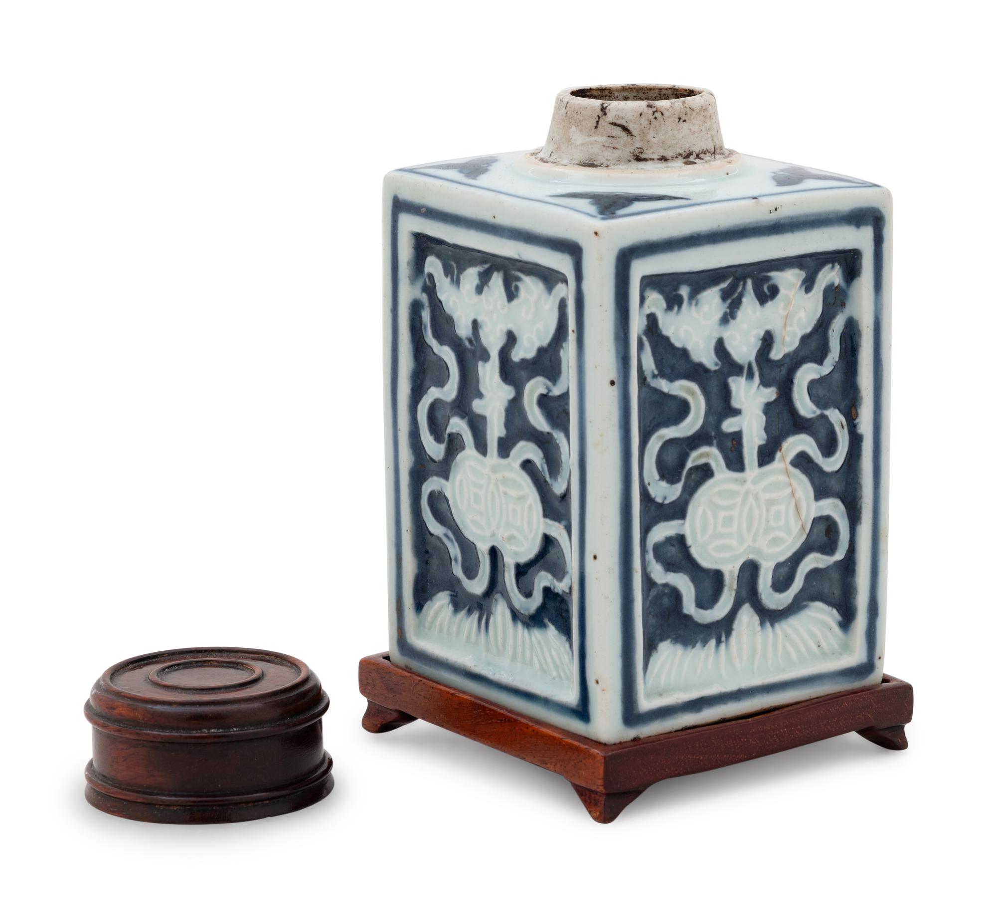 A Chinese White Slip Decorated Blue Ground Rectangular Tea Caddy