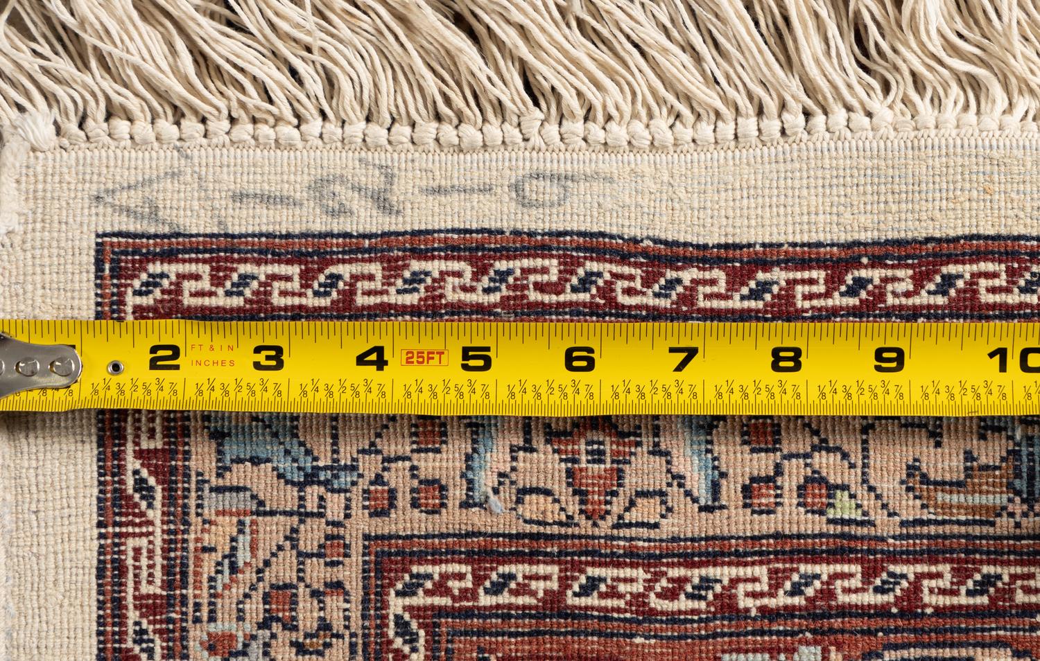 A Qom Wool Rug