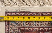 A Qom Wool Rug