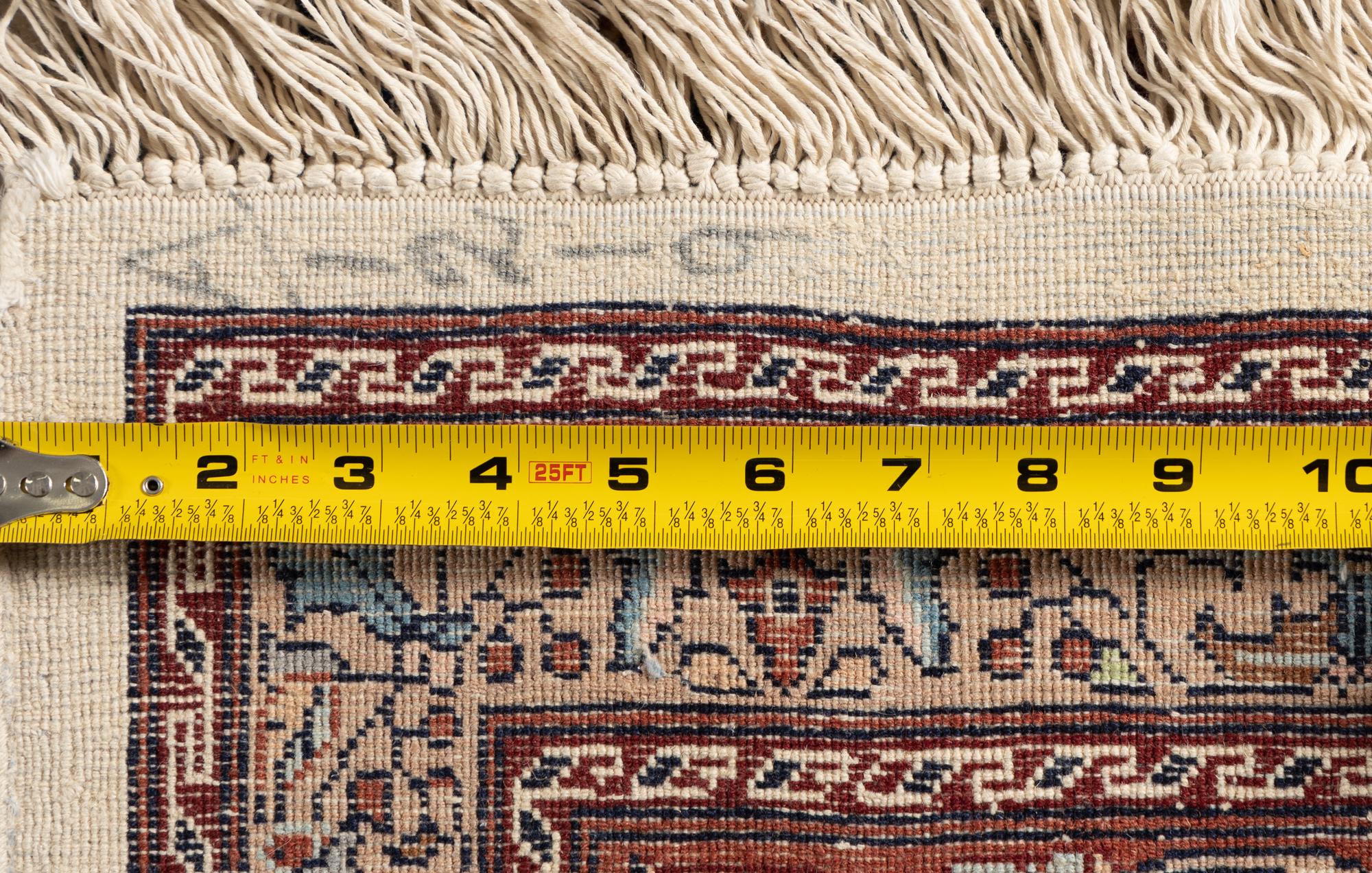 A Qom Wool Rug