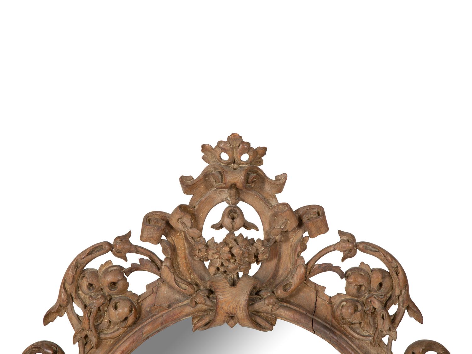An Italian Baroque Style Carved Walnut Mirror