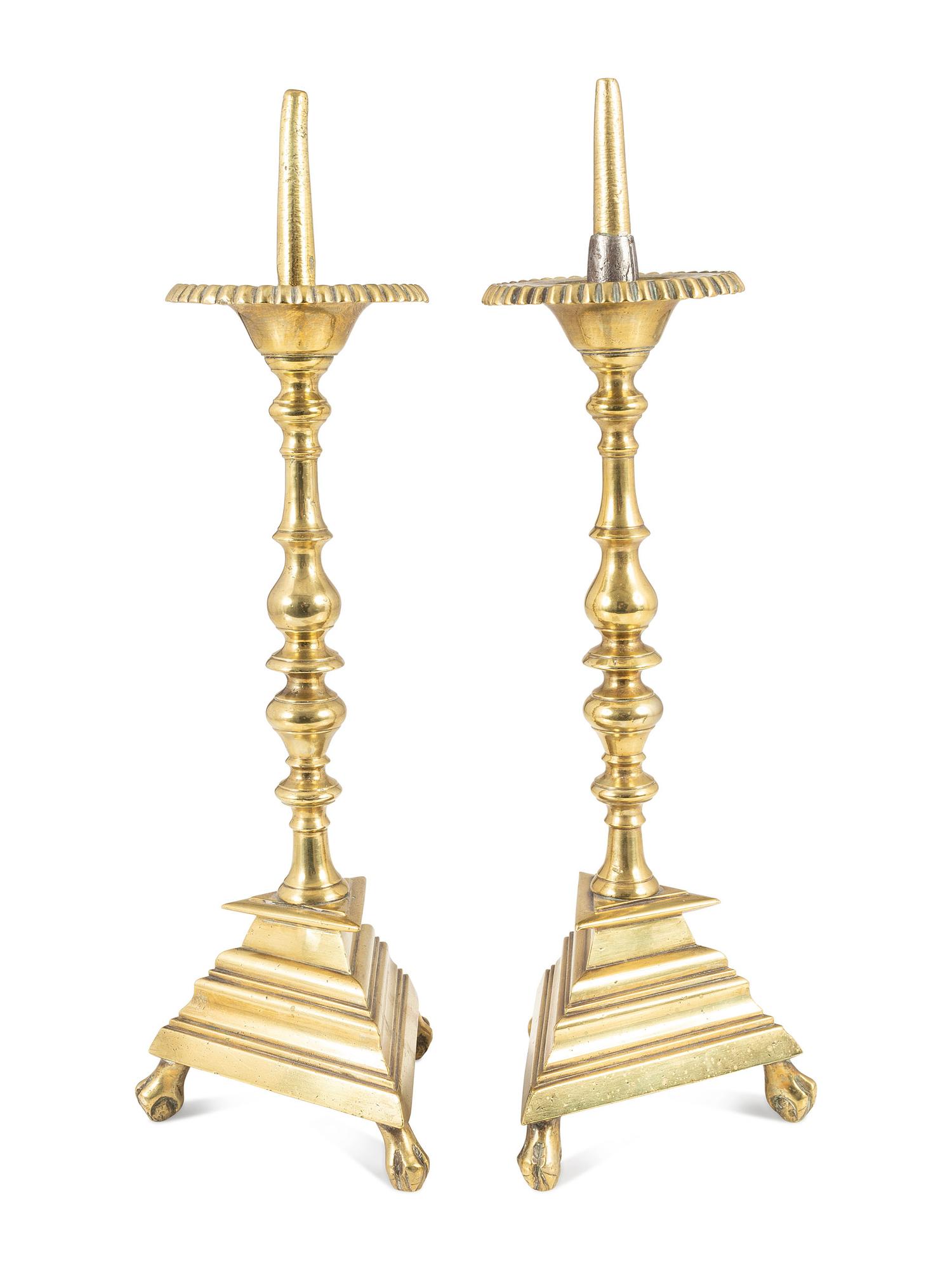 A Pair of Spanish Brass Triangular-Base Pricket Sticks