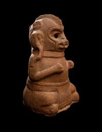 A Maya Figurine of a Seated Monkey