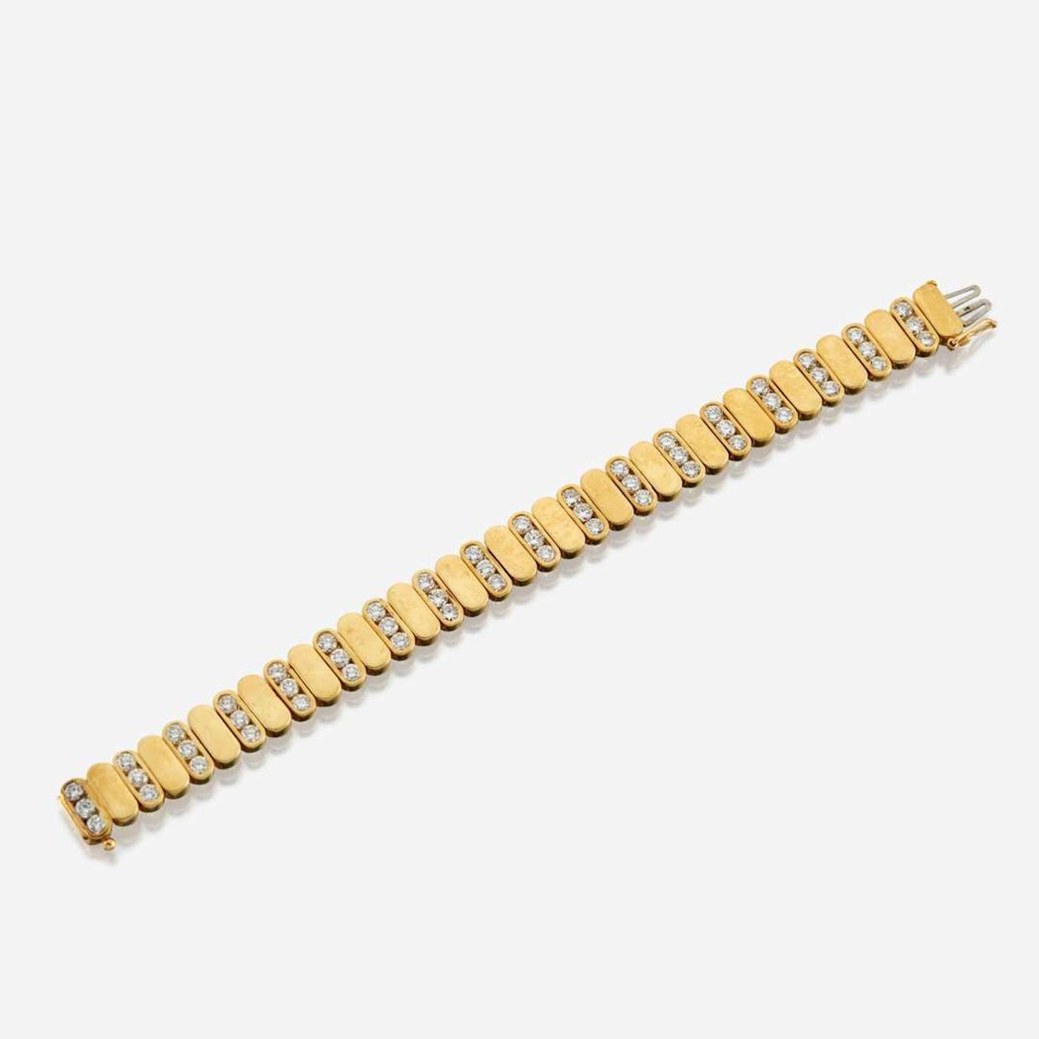 A gold and diamond bracelet