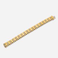 A gold and diamond bracelet
