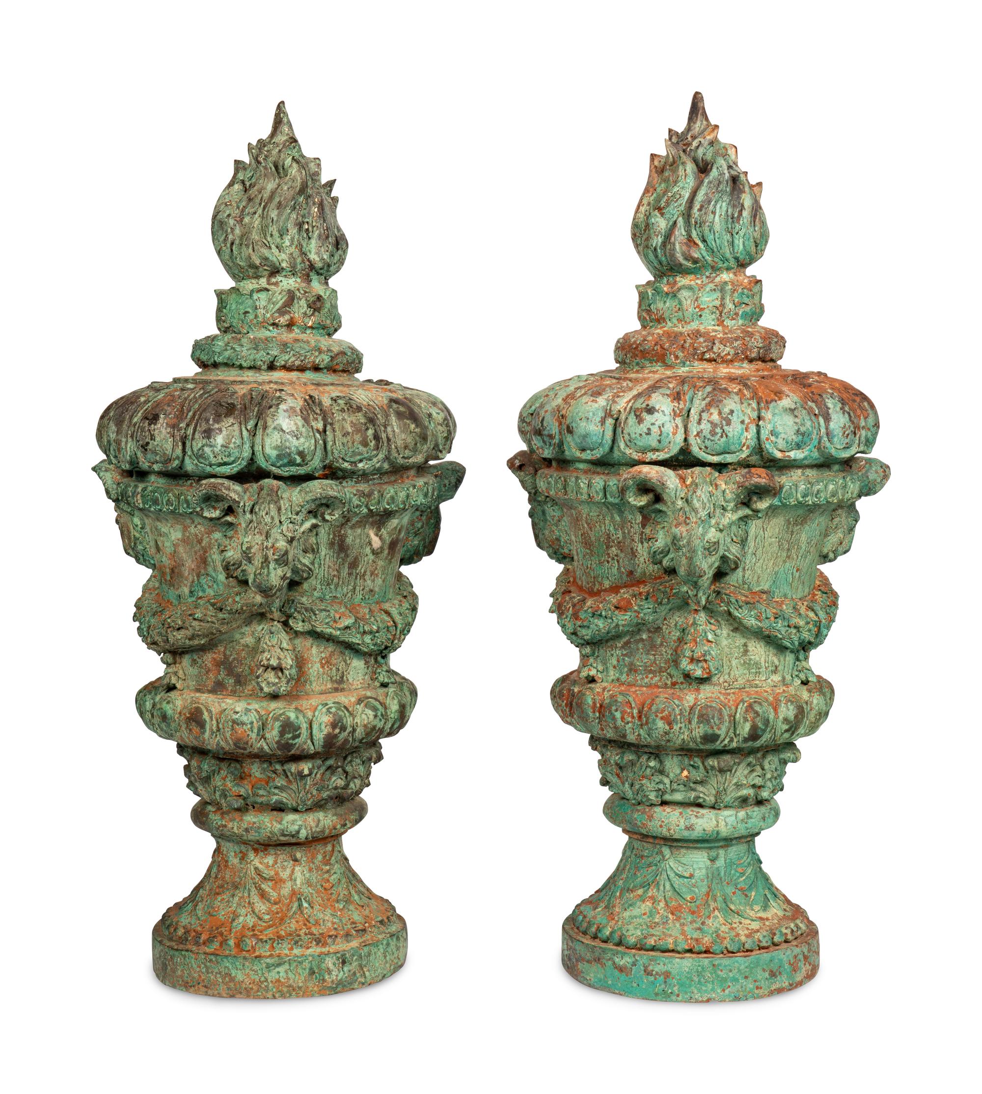 A Pair of Continental Patinated Metal Covered Urns