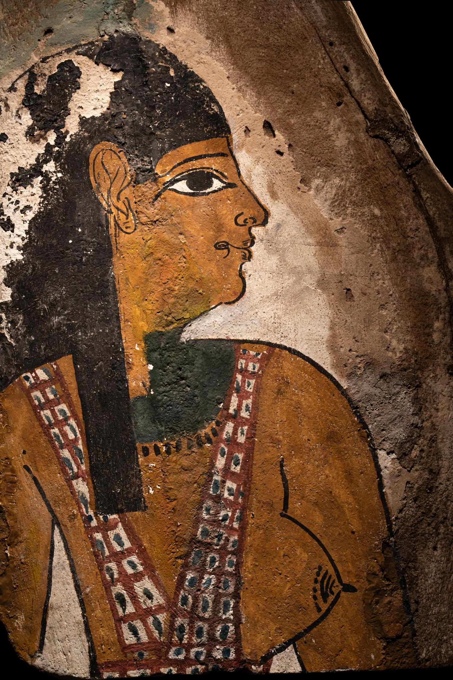 An Egyptian Polychrome Wood Fragment of a Sarcophagus with Isis