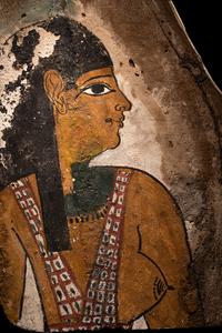 An Egyptian Polychrome Wood Fragment of a Sarcophagus with Isis