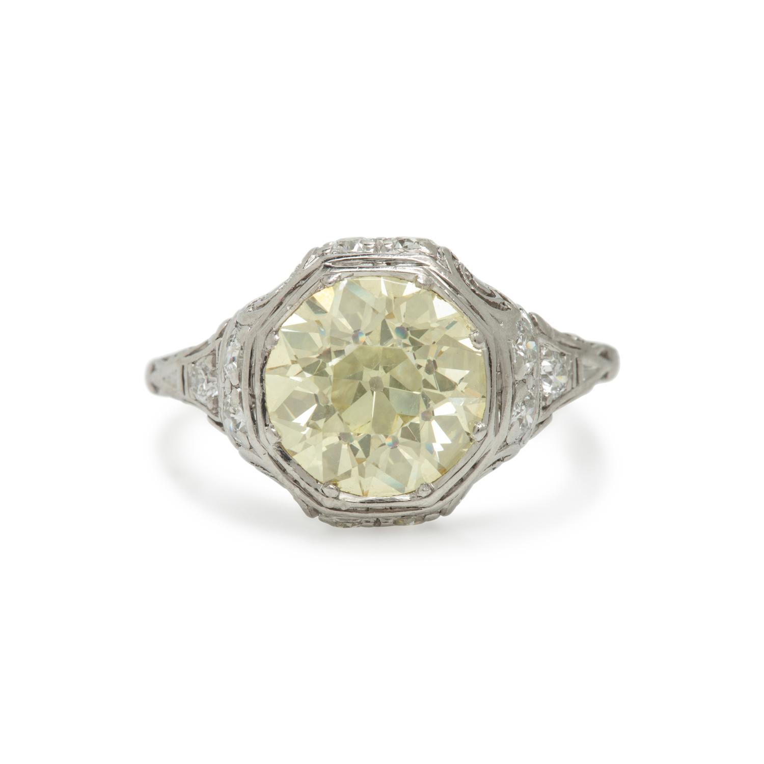 Yellow Diamond, Diamond, and Platinum Ring