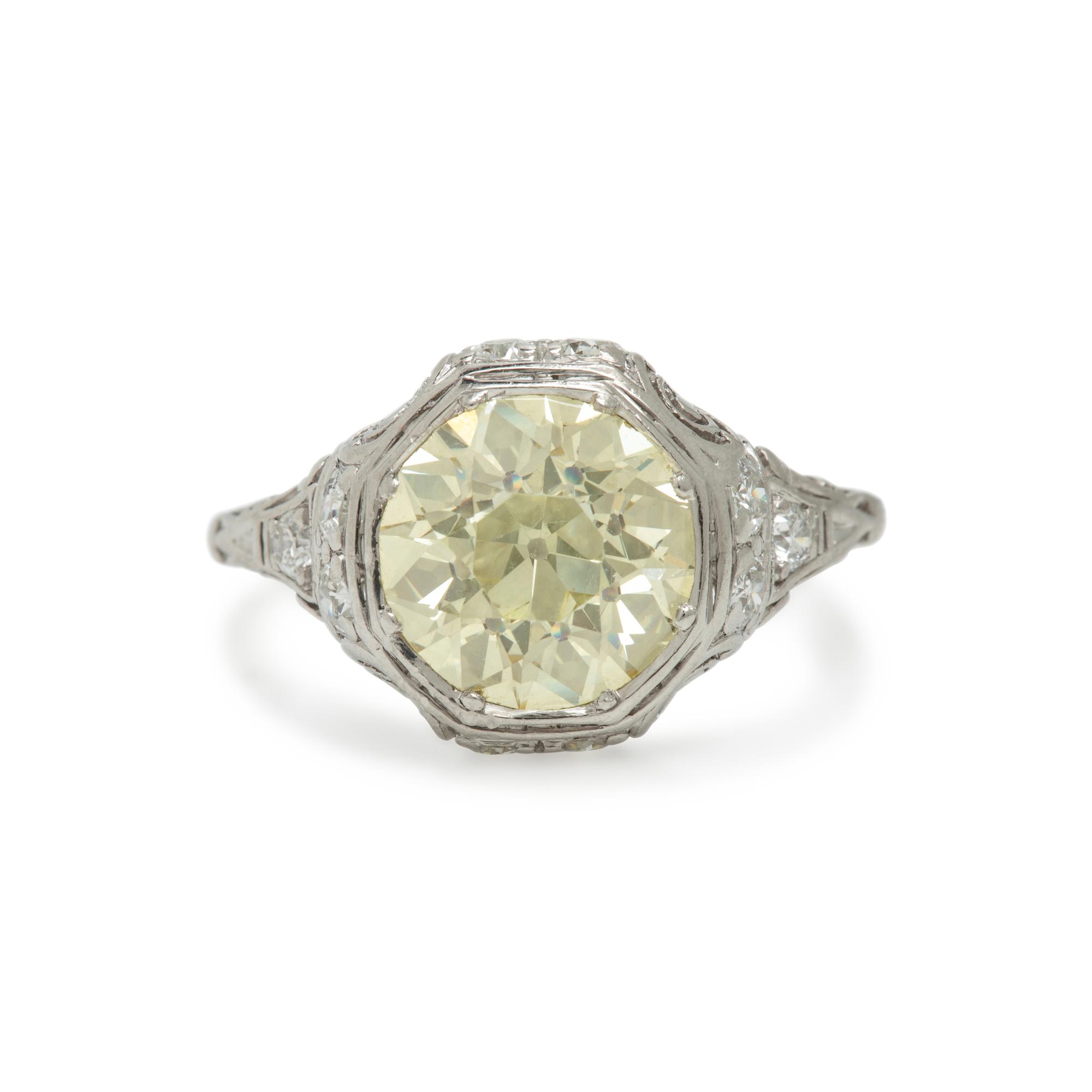Yellow Diamond, Diamond, and Platinum Ring