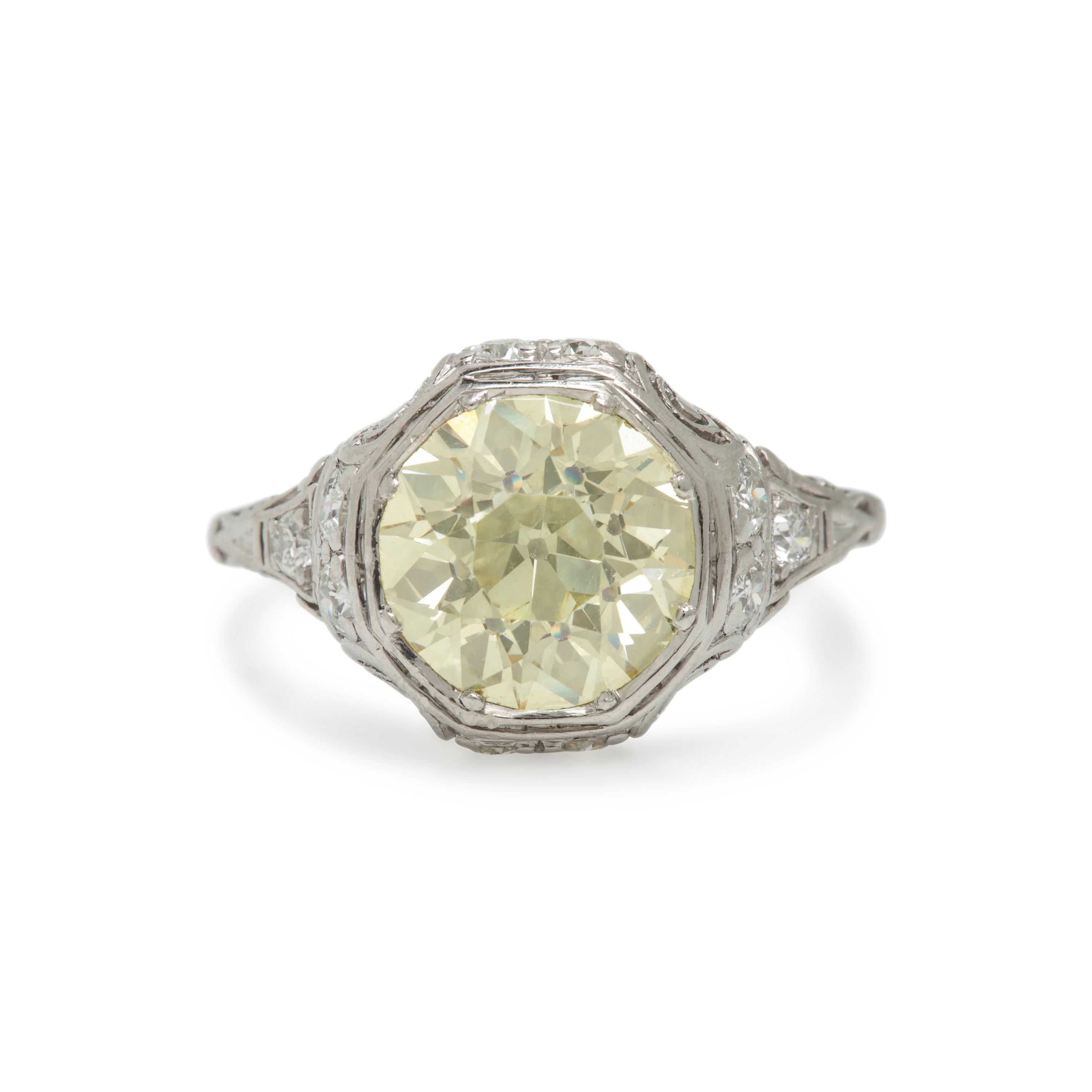 Yellow Diamond, Diamond, and Platinum Ring