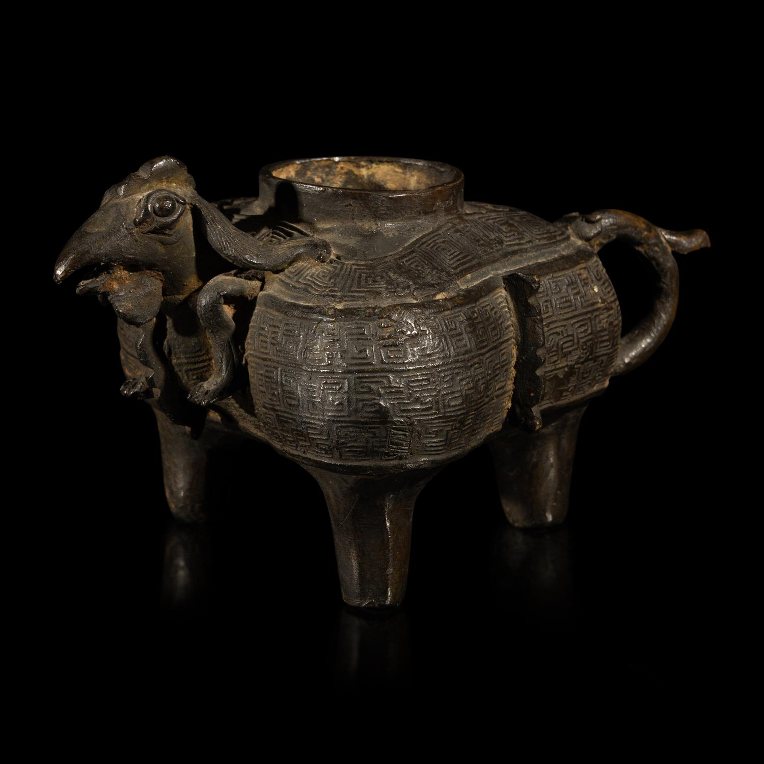 A Chinese Archaic Style Bronze He Vessel, 15th-16th Century — 明 銅仿古天鷄三足盉