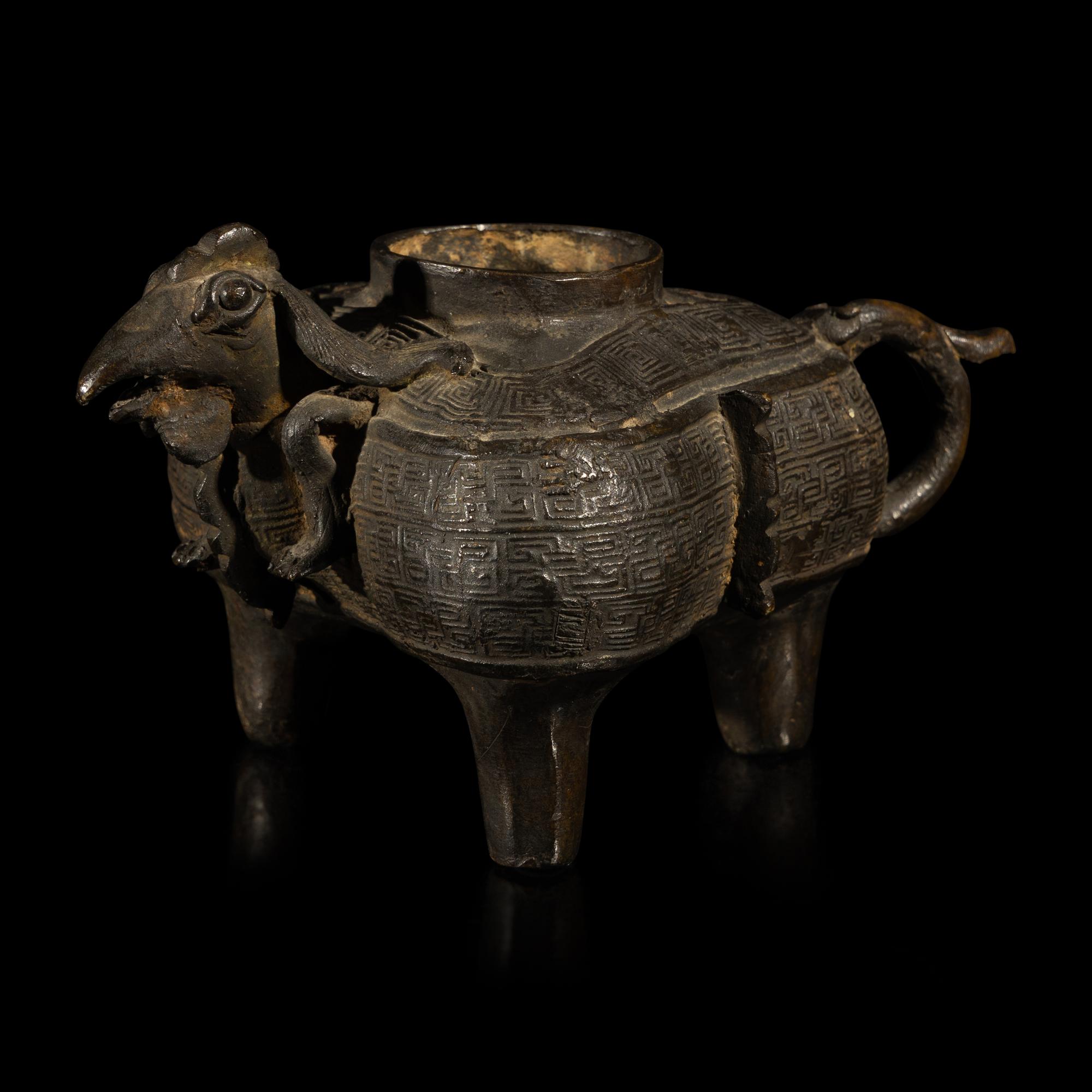 A Chinese Archaic Style Bronze He Vessel, 15th-16th Century — 明 銅仿古天鷄三足盉