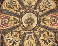 An Italian ecclesiastical embroidered silk roundel depicting a Saint, 18th century