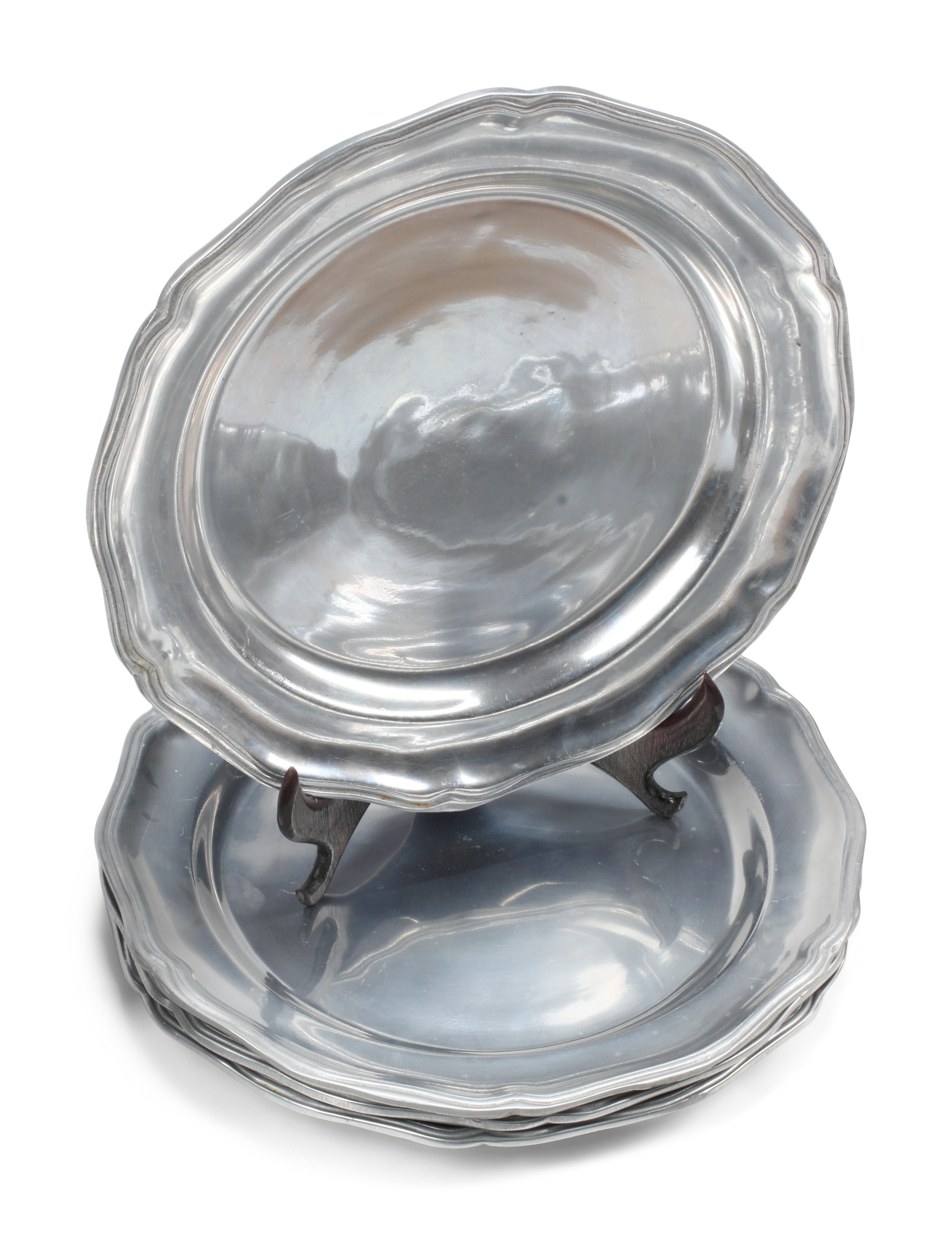 A Group of Twelve Pewter Scalloped Plates