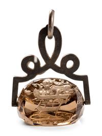 A German Carved Topaz and Gilt Metal Mounted Hand Seal