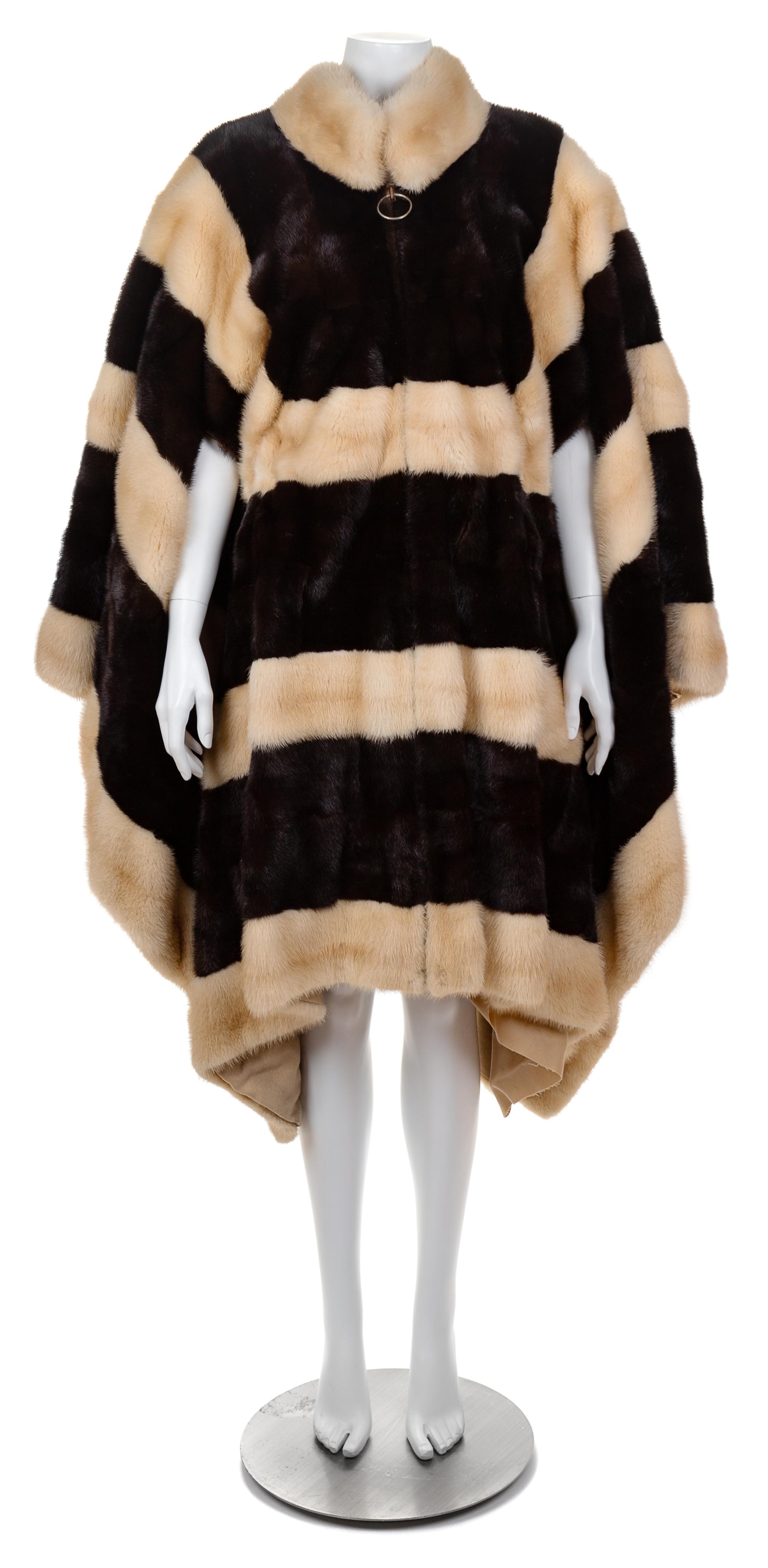 A Bergdorf Goodman Black and White Mink Horizontal Striped Cape, No size.