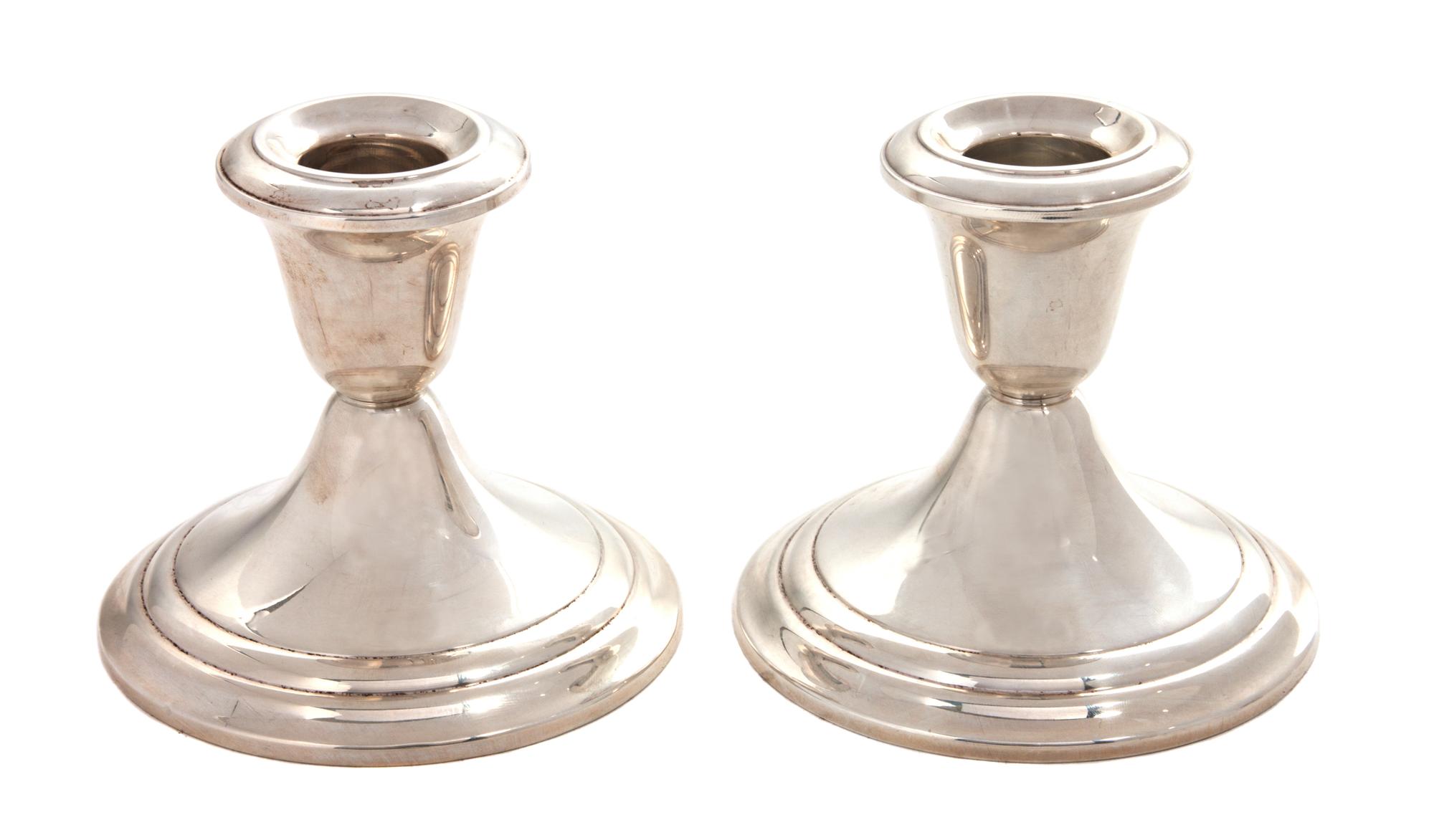 A Pair of American Silver Candlesticks, Gorham Mfg. Co., Providence, RI, with circular bases, weighted.