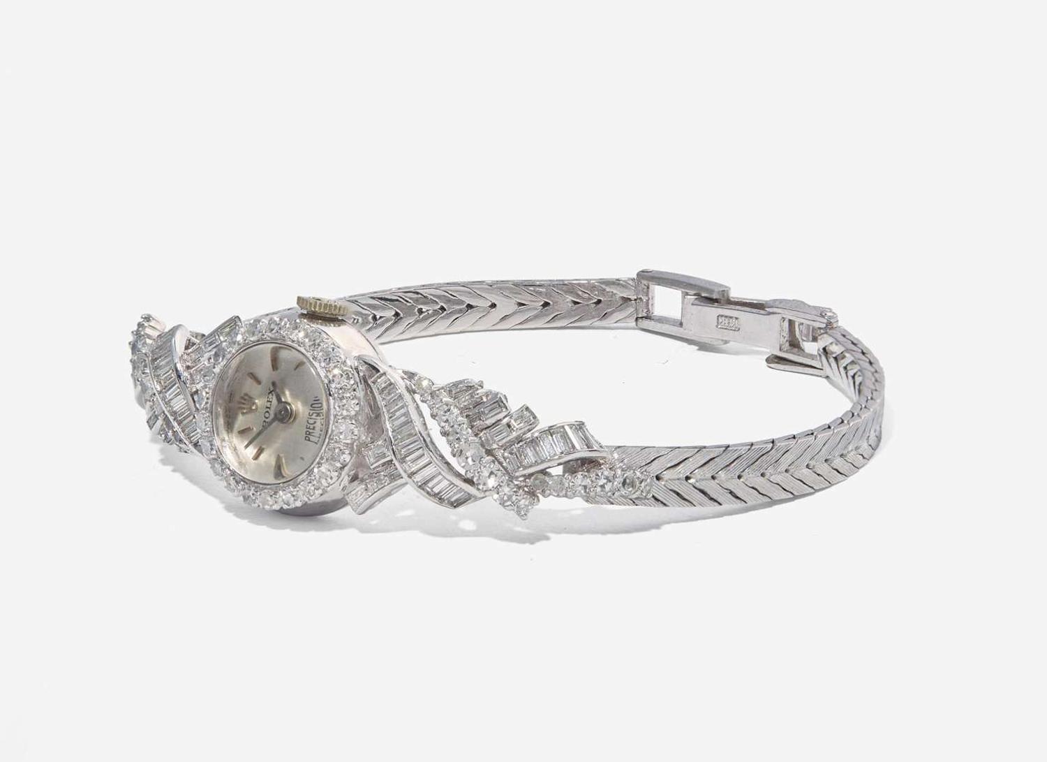 A Ladies 14K White Gold and Diamond Rolex Watch