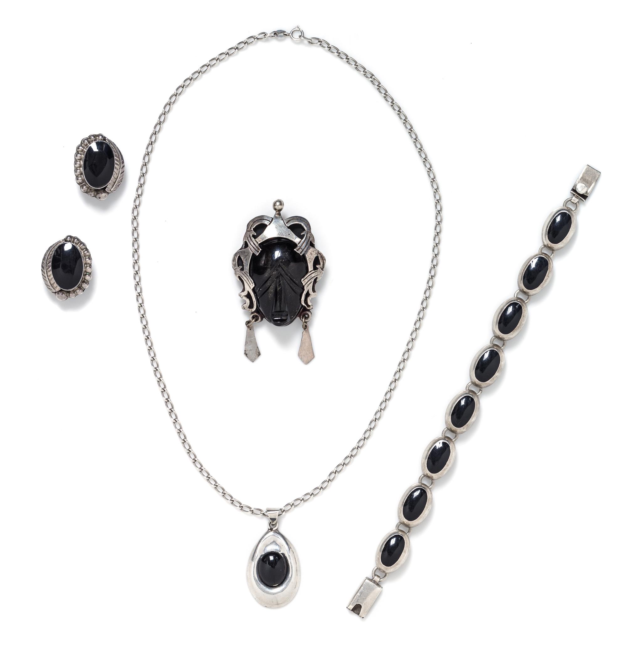 A Collection of Silver and Onyx Jewelry, 64.60 dwts.