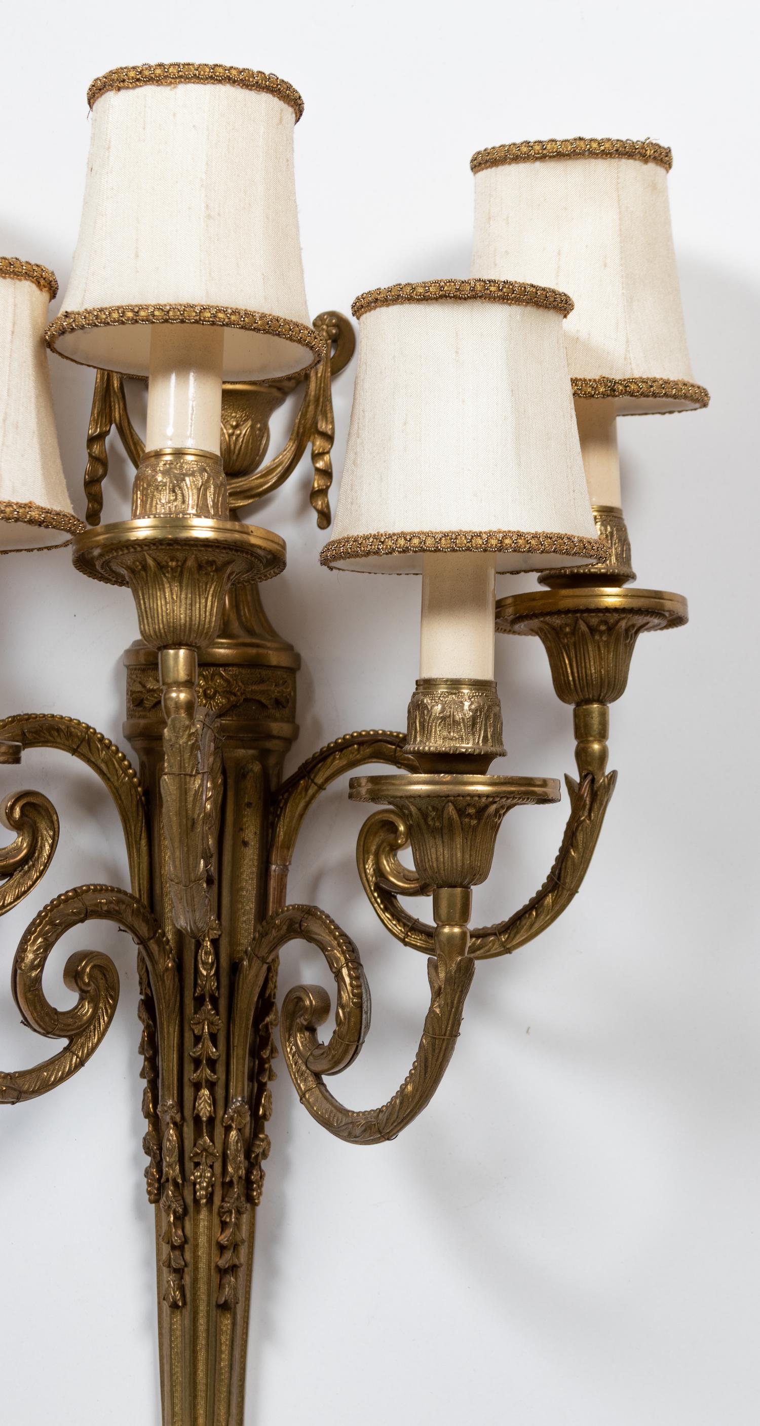 A Pair of Louis XVI Style Gilt-Bronze Five-Light Sconces
