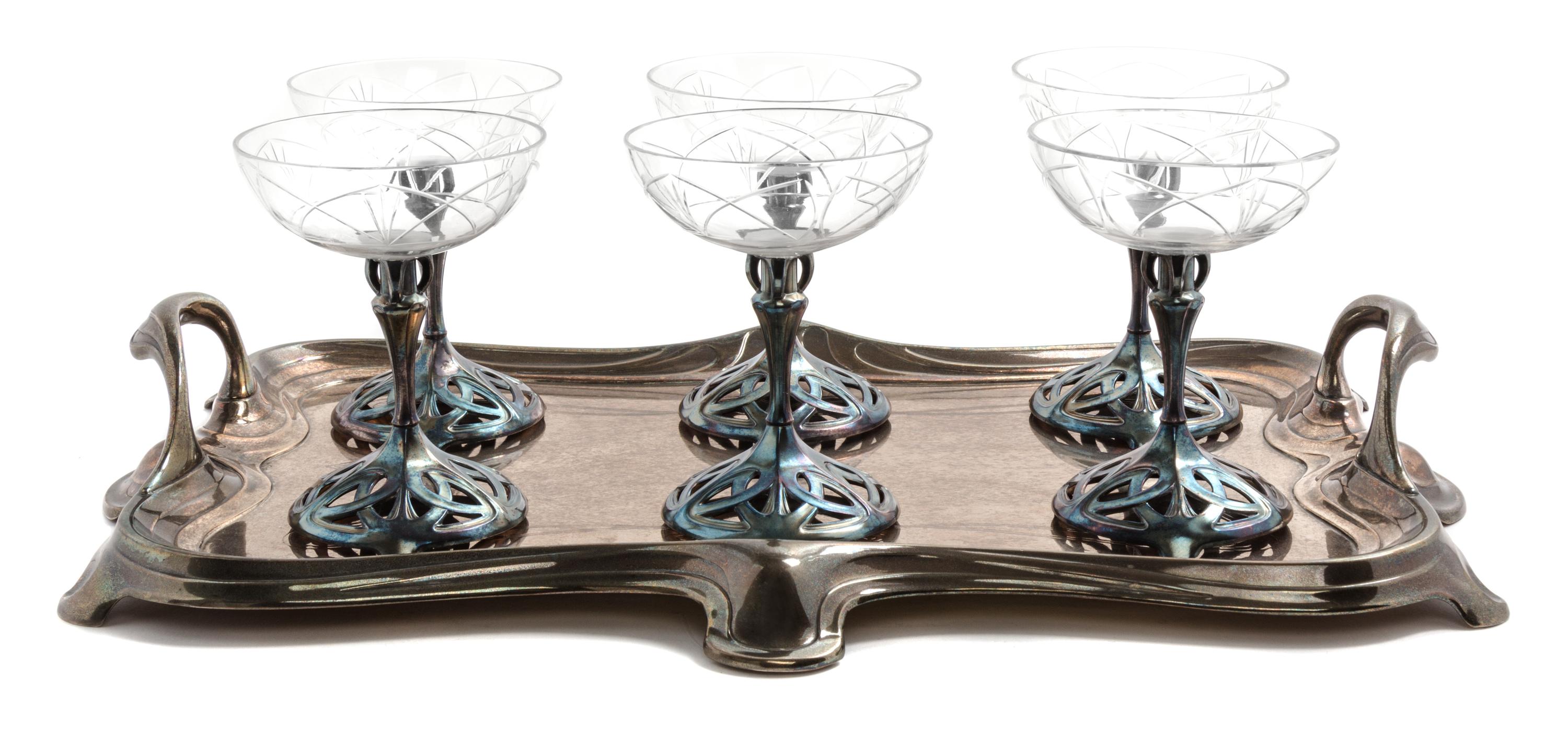 A German Art Nouveau Silver-plate and Etched Glass Champagne Set Height 5 1/8 inches, length of waiter over handles 18 3/4 inches. — WMF, CIRCA 1910