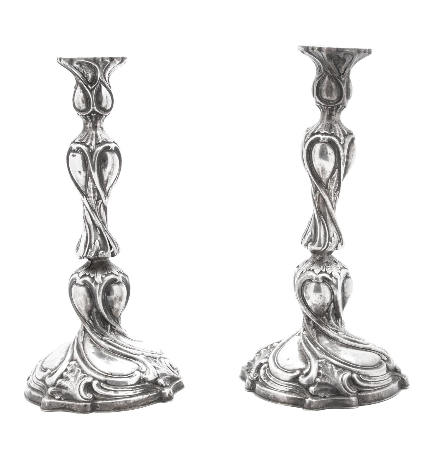 A Pair of Silver Candlesticks