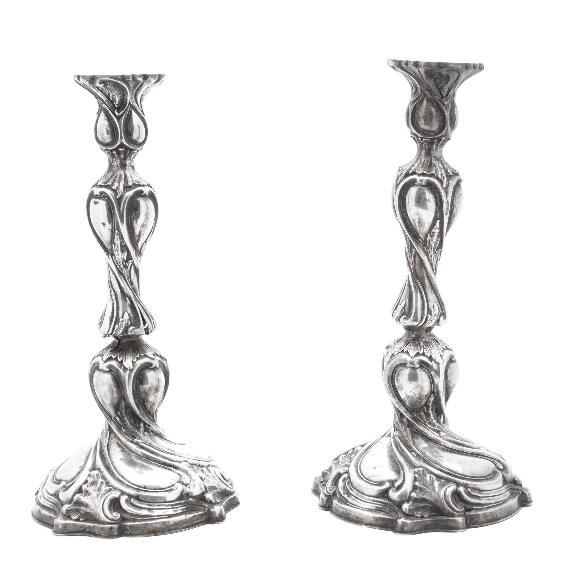 A Pair of Silver Candlesticks