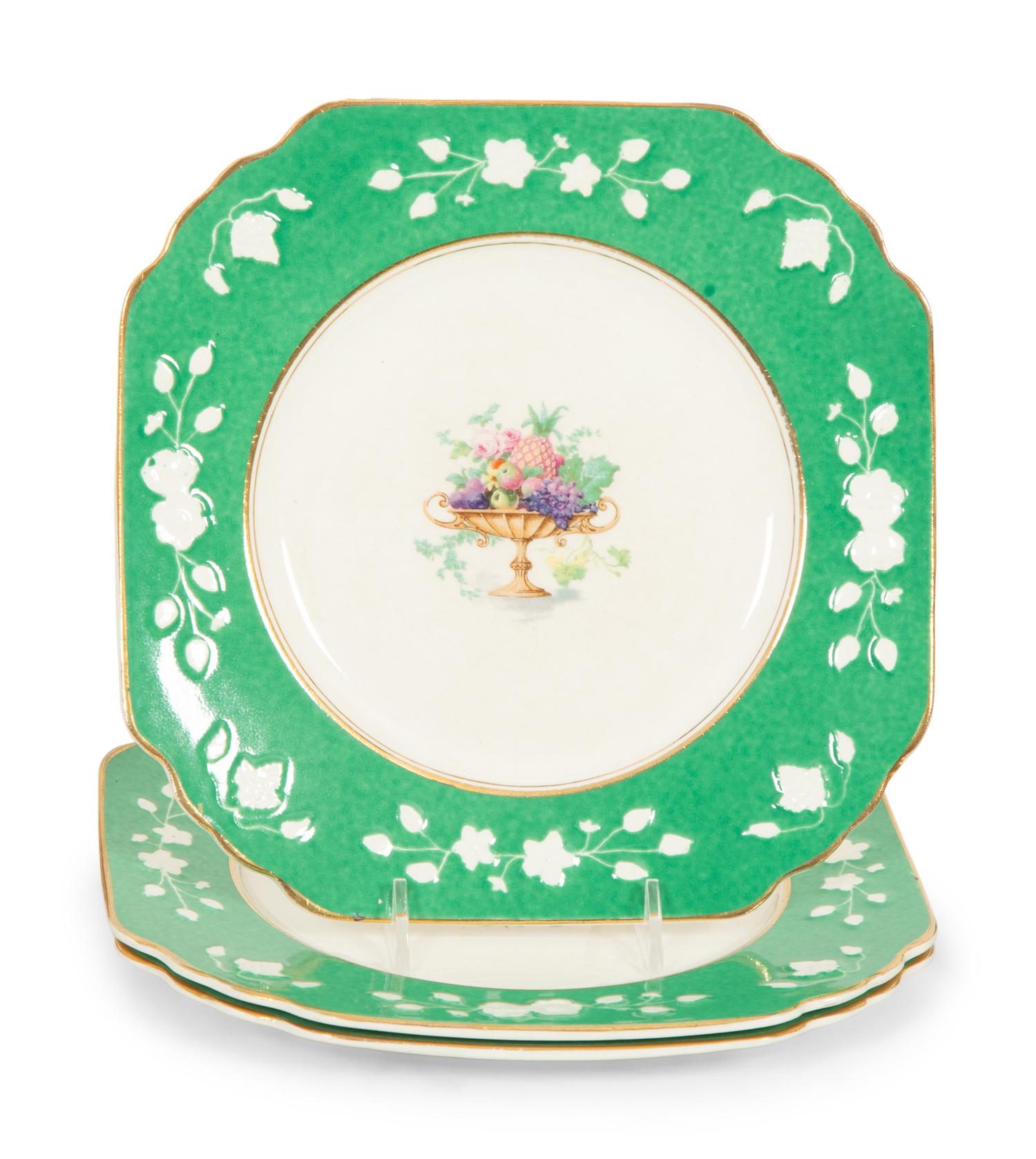 Four Sets of English Porcelain Dessert Plates and a Set of Twelve Soft-Paste Dinner Plates