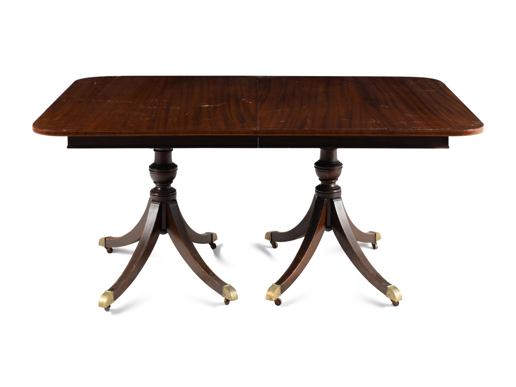 A George III Style Mahogany Double Pedestal Dining Table