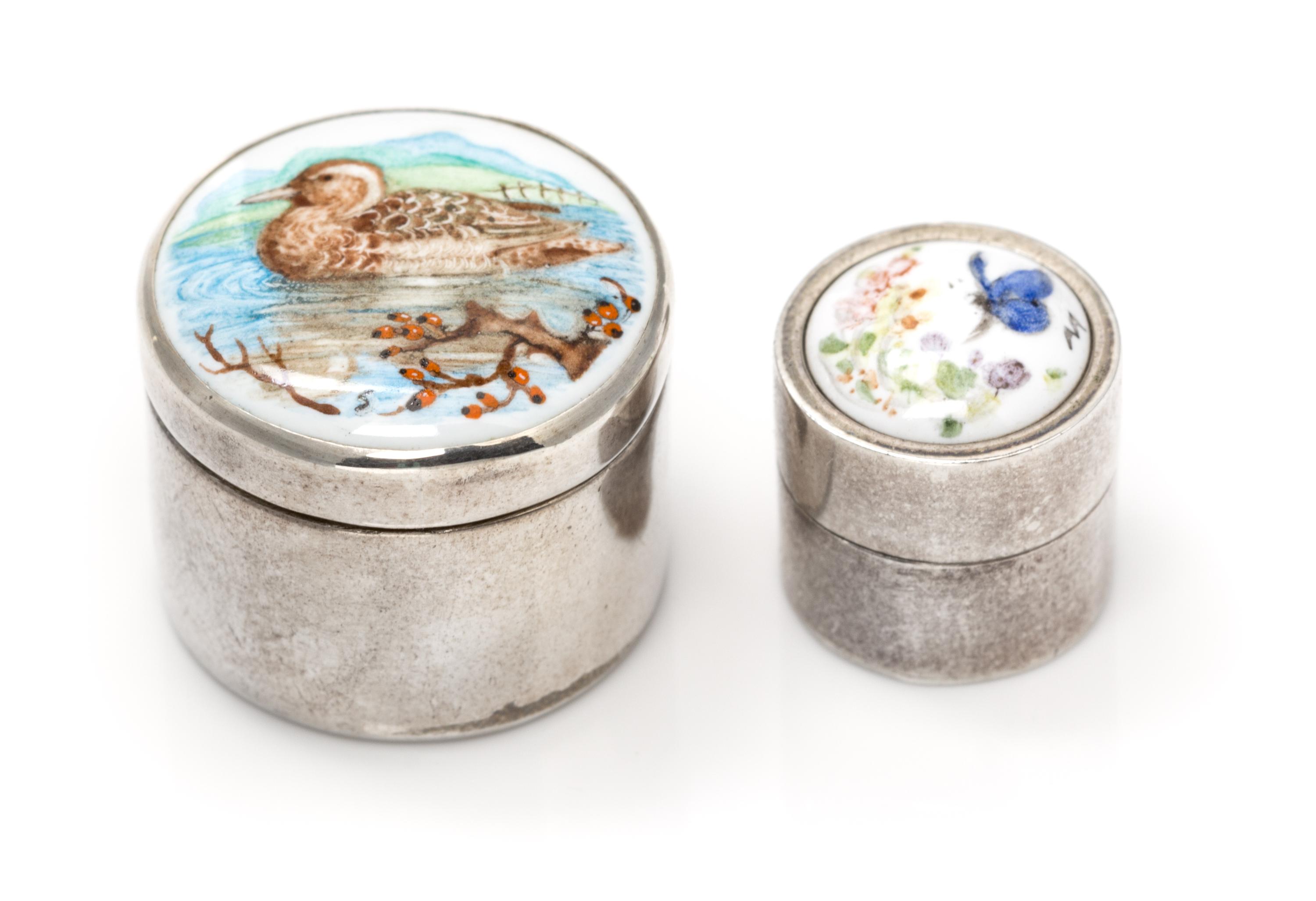 Two English Silver and Enamel Pill Boxes, Maker's Mark CNB, London, 1982 and 1985, one having a lid decorated with a butterfly and flor