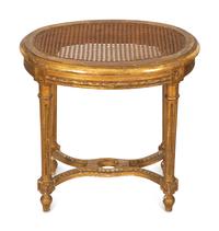 A Louis XVI Style Cane-Top Oval Table and a Louis XV Style Giltwood Square Table