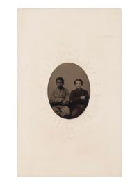 [AFRICAN AMERICANA - EARLY PHOTOGRAPHY]. Tintype of young African American and white male subjects seated together.