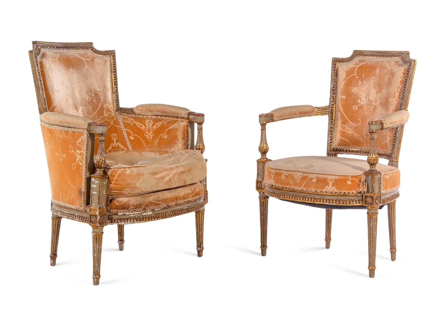 A Pair of Directoire Painted and Parcel Gilt Fauteuils and a Directoire Painted and Parcel Gilt Bergère