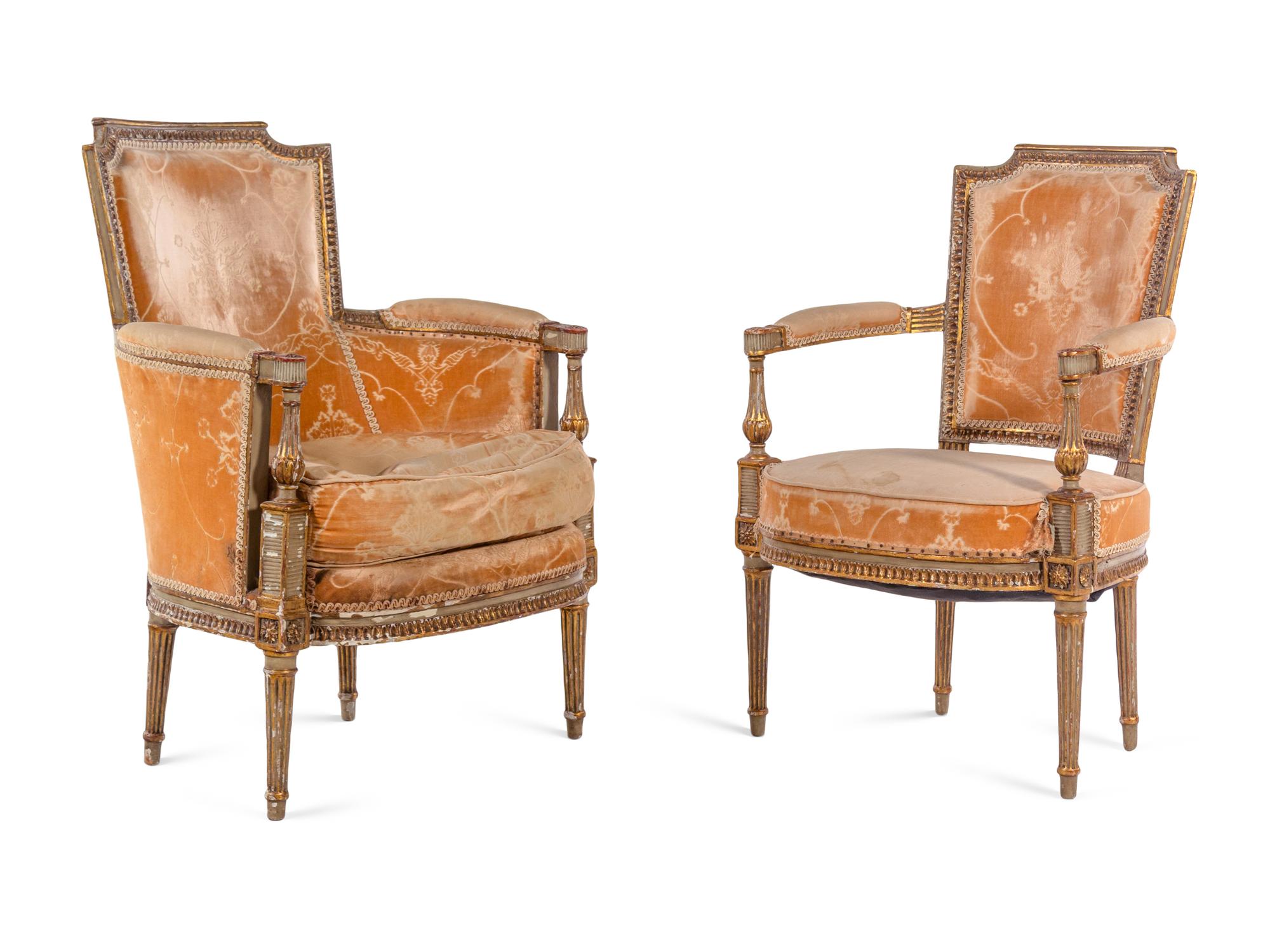 A Pair of Directoire Painted and Parcel Gilt Fauteuils and a Directoire Painted and Parcel Gilt Bergère