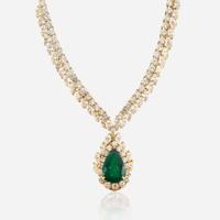 An emerald, diamond, and gold necklace