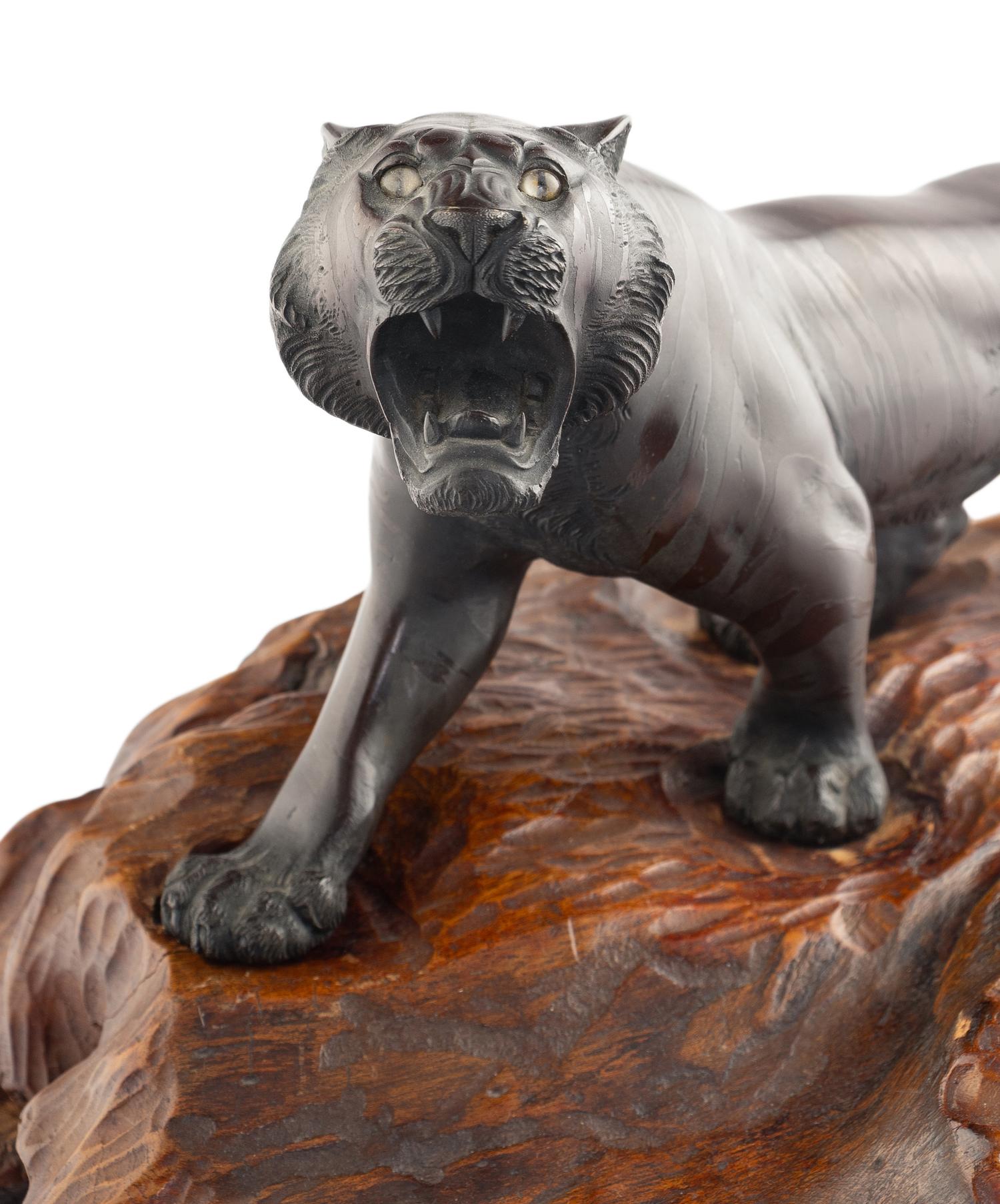 A Japanese Bronze Okimono of a Tiger