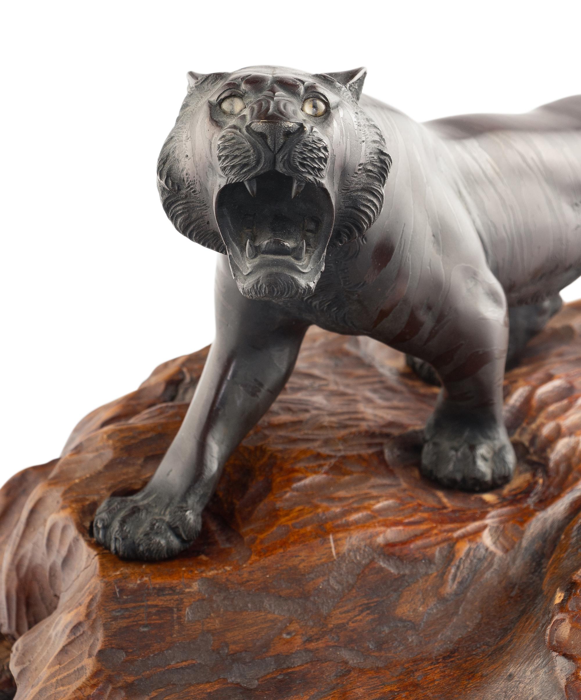 A Japanese Bronze Okimono of a Tiger